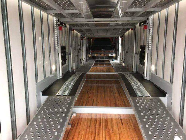 Car Shipping inside an enclosed auto transport car trailer that is very clean and new. Covered car services are available nationwide.