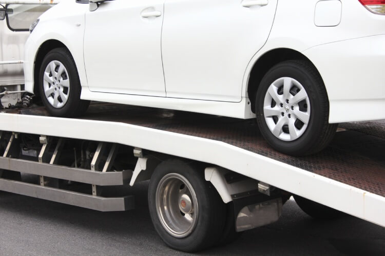 Car being loaded for transportation