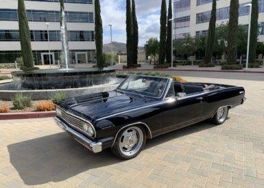 Shiny Black Convertible Classic Car During Daytime | National Transport Services