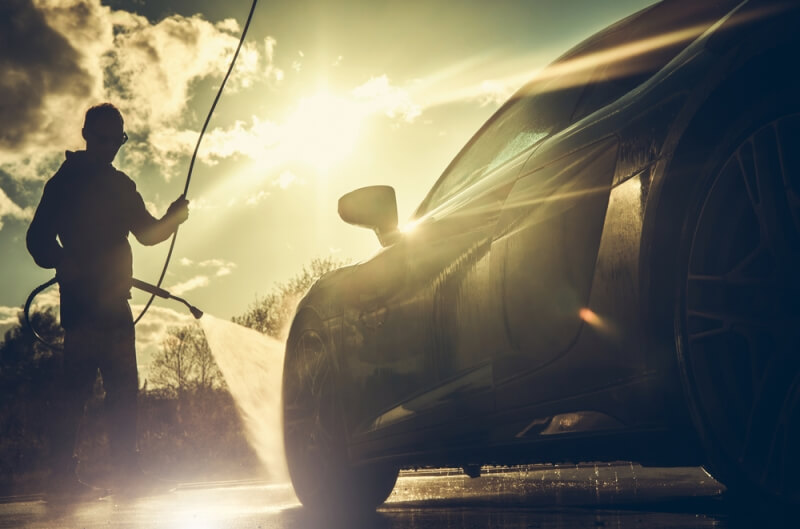 Exotic car being power washed