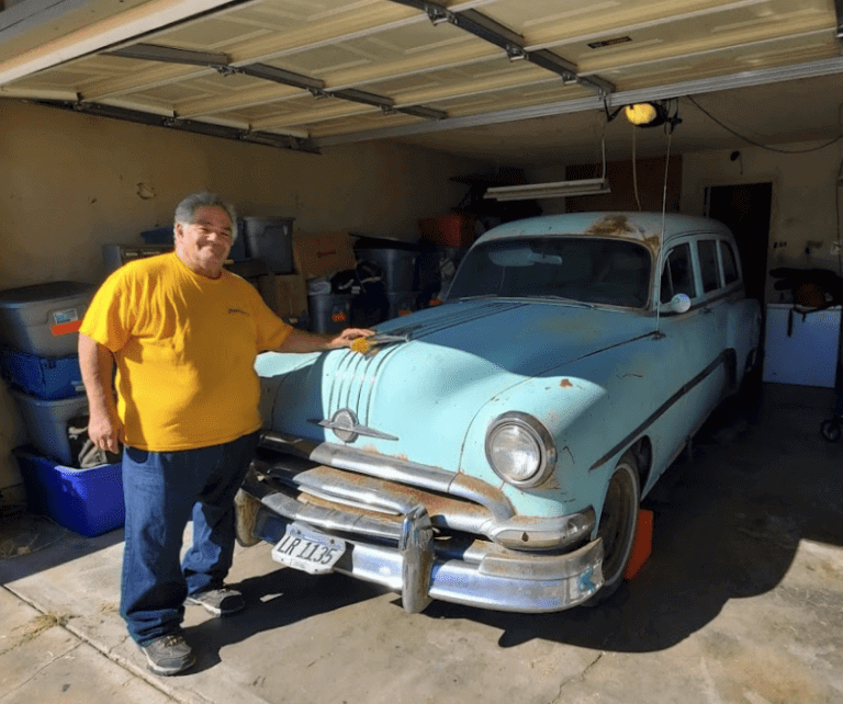 A satisfied client with his 1950s station wagon project. We provide door to door transport.