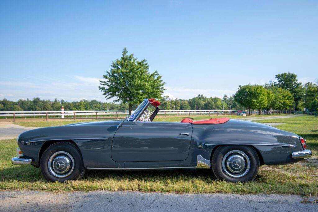 A Mercedes Benz 190SL in Gun Metal Grey and Red interior. Make sure to check the vehicle identification number and cross-check with the title.